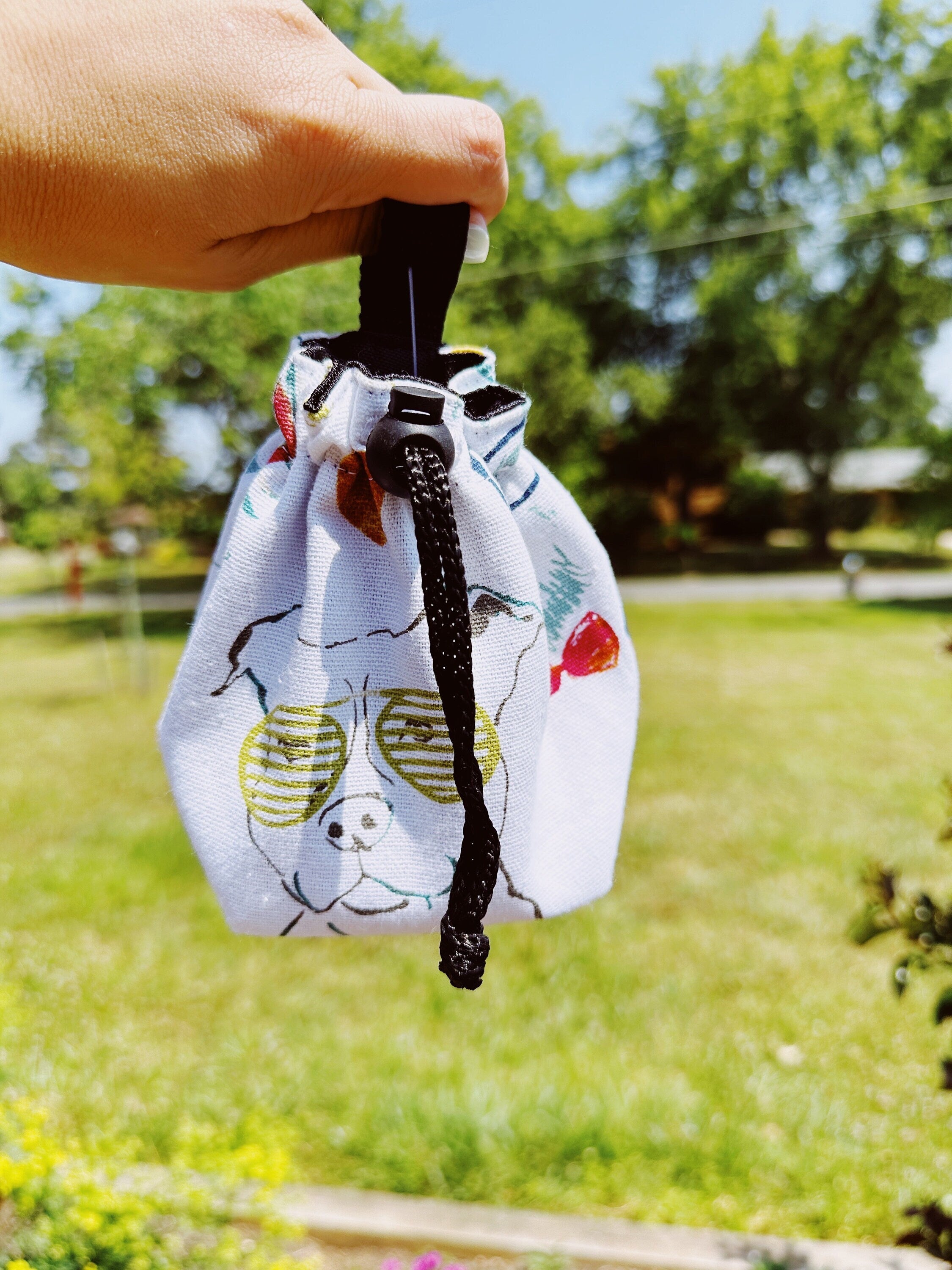 Dog with glasses treat bag