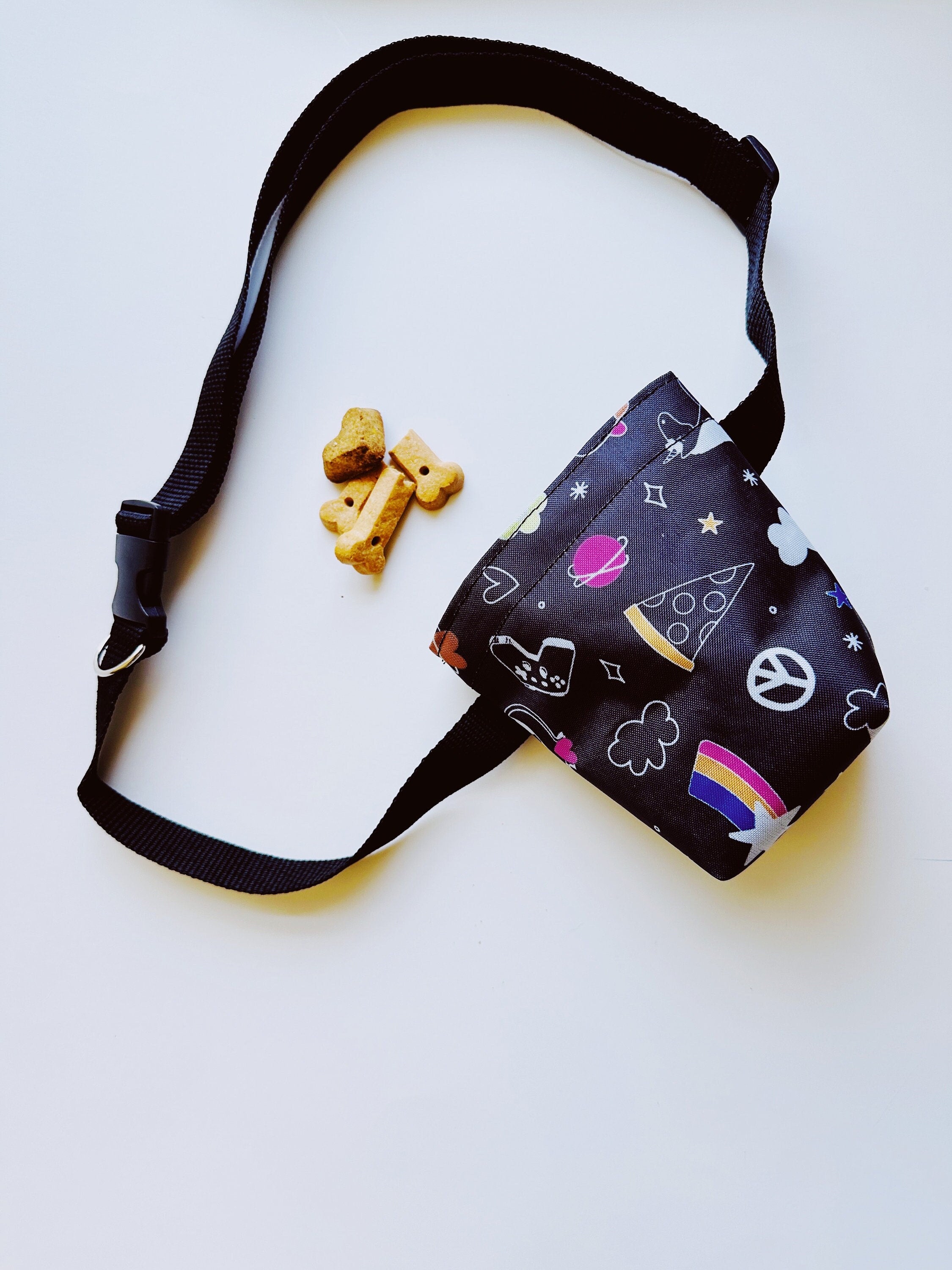 black fabric with multicolored grafiti bag