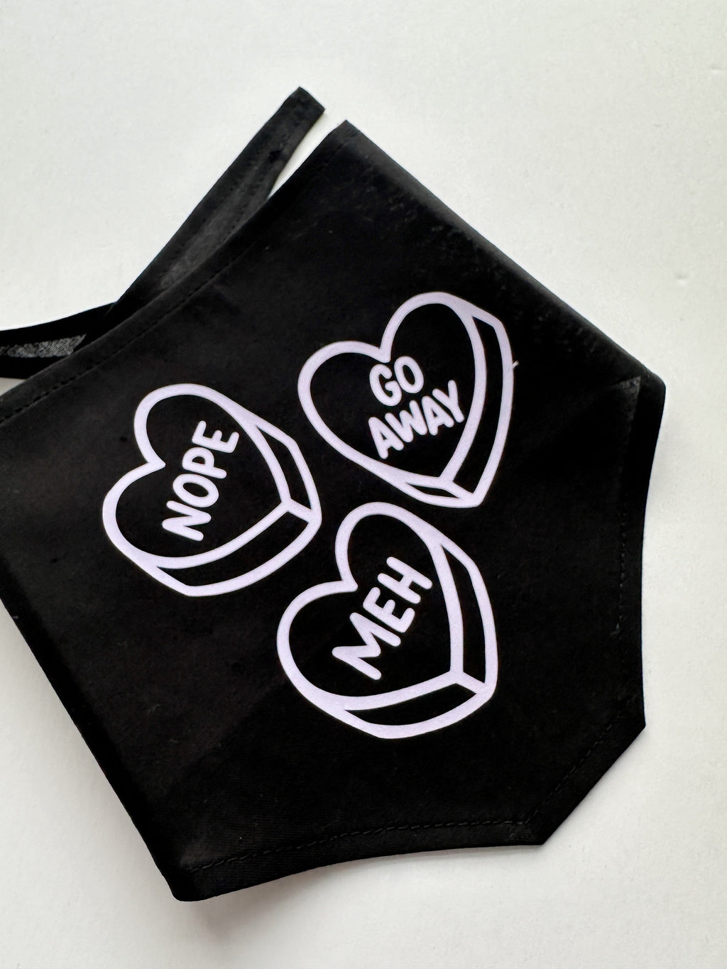 stylish anti-valentine pet bandana, perfect for both cats and dogs. meh, nope, go away lavender iron-on over black. Tie on triangular bandan