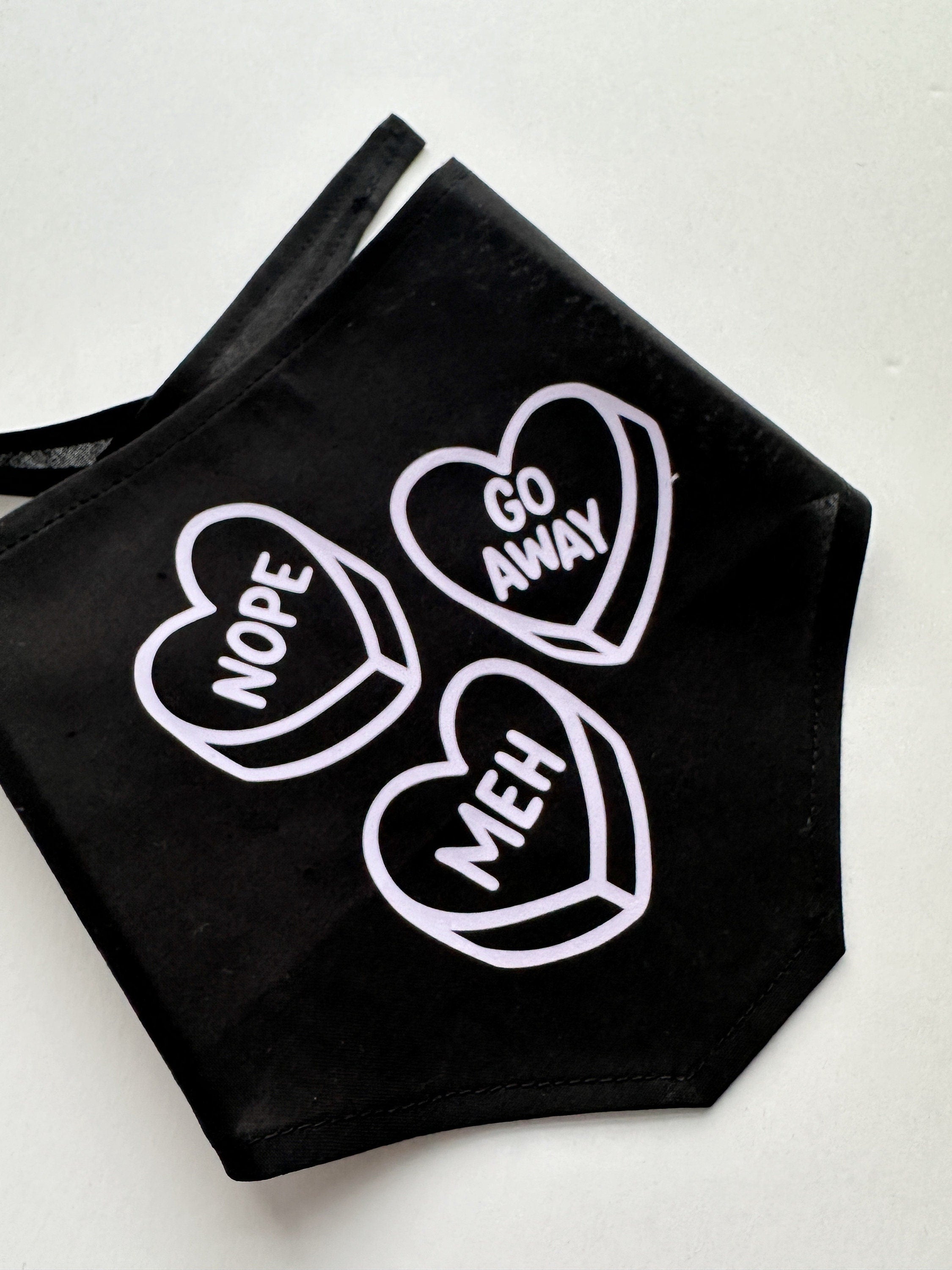 stylish anti-valentine pet bandana, perfect for both cats and dogs. meh, nope, go away lavender iron-on over black. Tie on triangular bandan